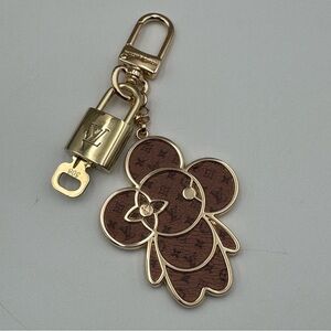 Authentic Louis Vuitton Lock and Key on Unbranded Bag Charm Gold and Brown